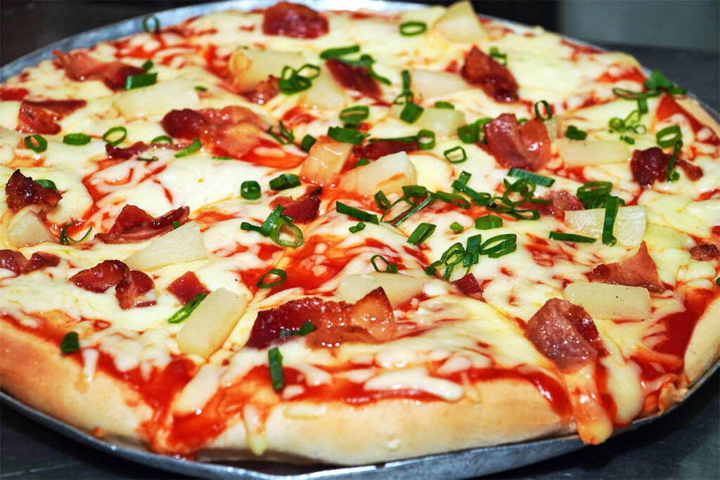 House-made pizza with local cheese, tomato sauce, and Hawaiian, Pepperoni & Mushroom, or Hearty Meat toppings